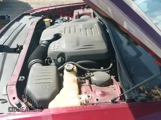 2018 Dodge Challenger GT z VIN 2C3CDZGGXJH302633, wystawiony jako IAAI lot #43039541 z przebiegiem 70 079 mil mil oraz . Historia ofert i sprzedaży dostępna na DreamBid. Obrazek 19.