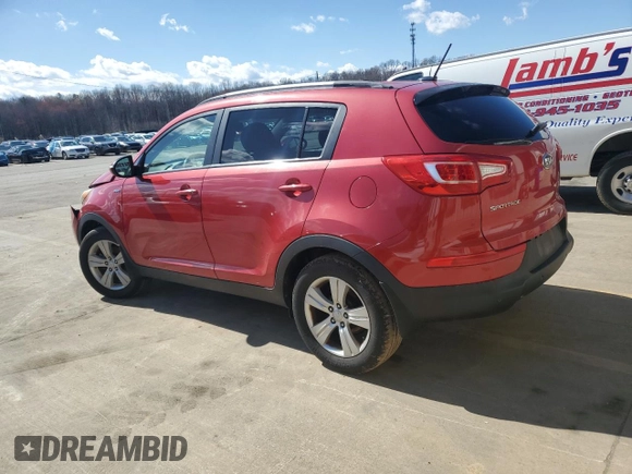 2011 Kia Sportage LX with VIN KNDPBCA27B7115456, listed as a Copart auction lot 50258315 with 142,153 mi miles and Salvage title. Bid and sale history available at DreamBid. Image 2.