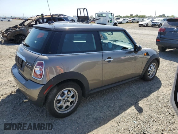 2013 MINI Hardtop with VIN WMWSU3C57DT678736, listed as a Copart auction lot 52586285 with 64,563 mi miles and Salvage Title. Bid and sale history available at DreamBid. Image 3.