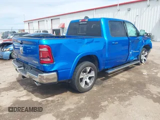 2021 Ram 1500 Laramie with VIN 1C6SRFJT1MN774879, listed as a IAAI auction lot 42242318 with 51,971 mi miles and . Bid and sale history available at DreamBid. Image 4.