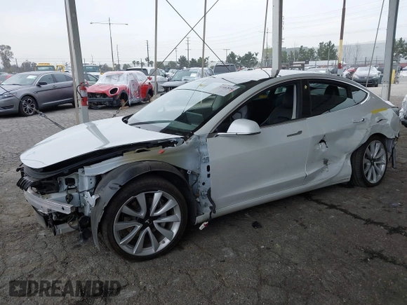2020 Tesla Model 3 Long Range with VIN 5YJ3E1EB5LF801530, listed as a IAAI auction lot 41682050 with 65,743 mi miles. Bid and sale history available at carsss.com. Image 2.