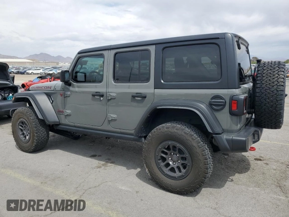 2023 Jeep Wrangler Rubicon with VIN 1C4JJXFG4PW523432, listed as a Copart auction lot 51642975 with 23,631 mi miles and Salvage title. Bid and sale history available at DreamBid. Image 2.