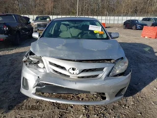 2012 Toyota Corolla L with VIN 2T1BU4EEXCC862368, listed as a IAAI auction lot 41829011 with 195,056 mi miles. Bid and sale history available at carsss.com. Image 12.