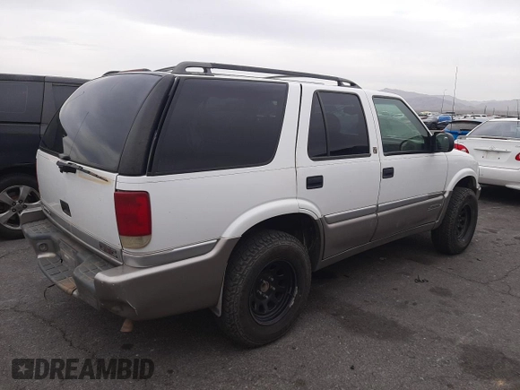 1999 GMC Jimmy SLE with VIN 1GKDT13W1X2551085, listed as a Copart auction lot 50553055 with 189,974 mi miles and Salvage Title. Bid and sale history available at carsss.com. Image 3.