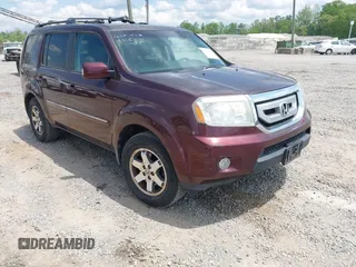 2009 Honda Pilot Touring z VIN 5FNYF38899B016824, wystawiony jako IAAI lot #42168180 z przebiegiem 211 511 mil mil oraz . Historia ofert i sprzedaży dostępna na DreamBid. Obrazek 1.
