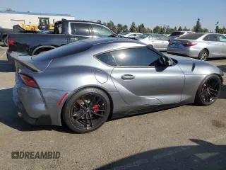 2021 Toyota GR Supra 3.0 with VIN WZ1DB0C04MW034647, listed as a Copart auction lot 73430074 with 68,910 mi miles and Salvage Title. Bid and sale history available at carsss.com. Image 3.