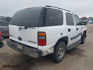 2003 Chevrolet Tahoe LS with VIN 1GNEC13V73R170941, listed as a IAAI auction lot 41088469 with 336,168 mi miles. Bid and sale history available at carsss.com. Image 4.