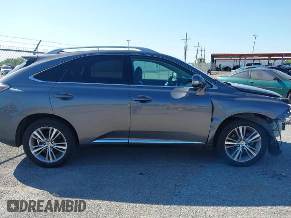 2015 Lexus RX 350 z VIN 2T2ZK1BA2FC177902, wystawiony jako IAAI lot #42119445 z przebiegiem 145 754 mil mil oraz . Historia ofert i sprzedaży dostępna na DreamBid. Obrazek 13.