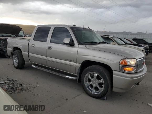 2005 GMC Sierra Denali z VIN 2GTEK63N951254277, wystawiony jako Copart lot #47635015 z przebiegiem 177 167 mil mil oraz Szkody całkowita. Historia ofert i sprzedaży dostępna na DreamBid. Obrazek 4.