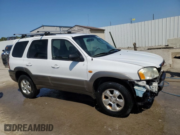 2002 Mazda Tribute LX with VIN 4F2YU09132KM10219, listed as a Copart auction lot 70619724 with 202,687 mi miles and Salvage Title. Bid and sale history available at carsss.com. Image 4.