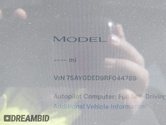 2024 Tesla Model Y with VIN 7SAYGDED9RF044789, listed as a IAAI auction lot 41817318 with Not Provided miles and . Bid and sale history available at DreamBid. Image 7.