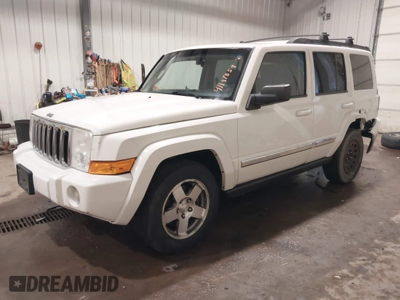2010 Jeep Commander Sport z VIN 1J4RG4GK7AC132121, wystawiony jako IAAI lot #41187854 z przebiegiem 155 413 mil mil oraz . Historia ofert i sprzedaży dostępna na DreamBid. Obrazek 2.