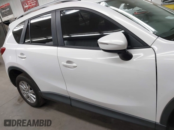 2016 Mazda CX-5 Sport with VIN JM3KE2BY8G0787130, listed as a IAAI auction lot 41847443 with 96,611 mi miles. Bid and sale history available at carsss.com. Image 13.