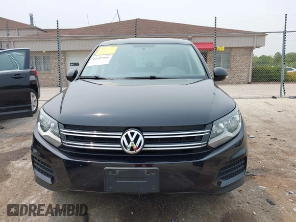 2013 Volkswagen Tiguan S with VIN WVGAV3AX2DW594334, listed as a IAAI auction lot 42405989 with 96,559 mi miles and . Bid and sale history available at DreamBid. Image 12.