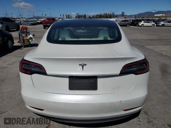 2022 Tesla Model 3 with VIN 5YJ3E1EAXNF203914, listed as a Copart auction lot 46982935 with 70,766 mi miles and Salvage Title. Bid and sale history available at DreamBid. Image 6.