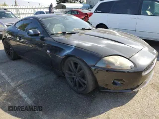 2008 Jaguar XK with VIN SAJWA43B985B23651, listed as a Copart auction lot 54621835 with 145,429 mi miles and Clean Title. Bid and sale history available at DreamBid. Image 4.
