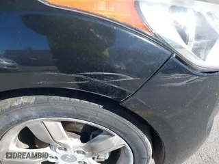 2015 Hyundai Veloster RE:FLEX with VIN KMHTC6AD7FU224291, listed as a IAAI auction lot 41517267 with 151,554 mi miles. Bid and sale history available at carsss.com. Image 15.