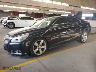 2013 Chevrolet Malibu LTZ with VIN 1G11J5SX8DF249828, listed as a Copart auction lot 82665394 with 209,370 mi miles and Salvage Title. Bid and sale history available at carsss.com. Image 1.
