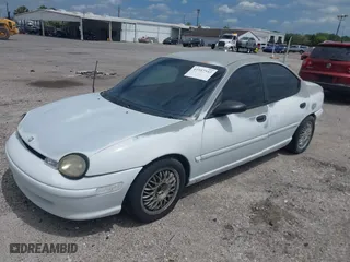 1998 Dodge Neon Competition with VIN 1B3ES47C4WD574210, listed as a IAAI auction lot 41957542 with 98,477 mi miles. Bid and sale history available at carsss.com. Image 2.