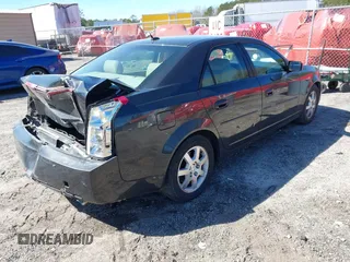2005 Cadillac CTS with VIN 1G6DP567150204346, listed as a IAAI auction lot 41643967 with 214,221 mi miles. Bid and sale history available at carsss.com. Image 4.