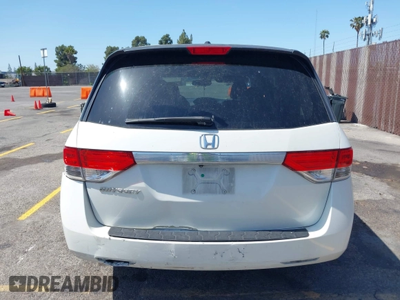 2015 Honda Odyssey EX-L with VIN 5FNRL5H67FB017554, listed as a IAAI auction lot 41974821 with 76,130 mi miles and . Bid and sale history available at carsss.com. Image 16.