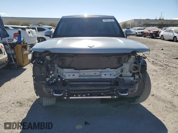2023 Rivian R1S Adventure z VIN 7PDSGABA1PN021963, wystawiony jako Copart lot #43451105 z przebiegiem 165 mil mil oraz Szkody całkowita. Historia ofert i sprzedaży dostępna na DreamBid. Obrazek 5.