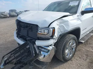 2017 GMC Sierra 1500 SLT z VIN 3GTU2NEC7HG450490, wystawiony jako IAAI lot #41400241 z przebiegiem 89 336 mil mil oraz . Historia ofert i sprzedaży dostępna na DreamBid. Obrazek 6.