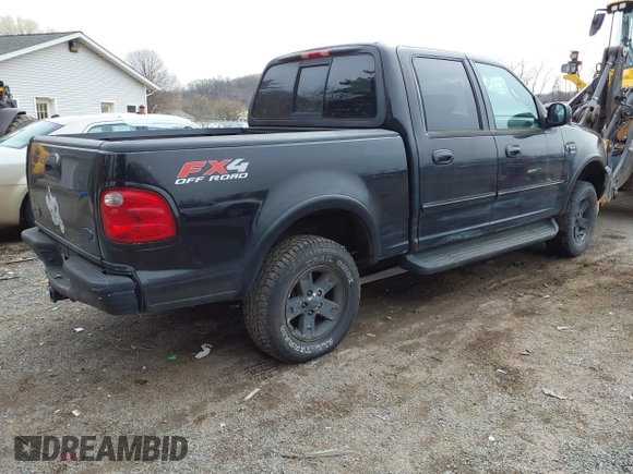 2002 Ford F-150 XLT with VIN 1FTRW08L12KB91777, listed as a IAAI auction lot 42007013 with 192,758 mi miles. Bid and sale history available at carsss.com. Image 4.