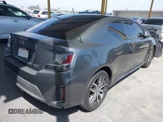 2015 Scion tC with VIN JTKJF5C7XF3088807, listed as a IAAI auction lot 41958463 with 87,647 mi miles. Bid and sale history available at carsss.com. Image 4.