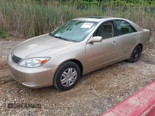 2004 Toyota Camry LE with VIN 4T1BE32K44U904678, listed as a IAAI auction lot 42244005 with 208,846 mi miles and . Bid and sale history available at DreamBid. Image 2.