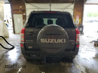 2012 Suzuki Grand Vitara Limited z VIN JS3TD0D79C4100640, wystawiony jako Copart lot #58167975 z przebiegiem 138 376 mil mil oraz Tytuł czysty. Historia ofert i sprzedaży dostępna na DreamBid. Obrazek 6.