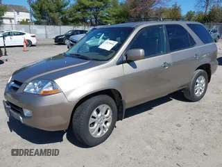 2003 Acura MDX Touring Pkg with VIN 2HNYD18623H549599, listed as a IAAI auction lot 41879934 with 242,896 mi miles. Bid and sale history available at carsss.com. Image 2.