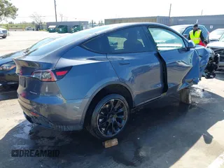 2020 Tesla Model Y Long Range with VIN 5YJYGDEF8LF000658, listed as a IAAI auction lot 41669246 with 44,281 mi miles and . Bid and sale history available at DreamBid. Image 4.