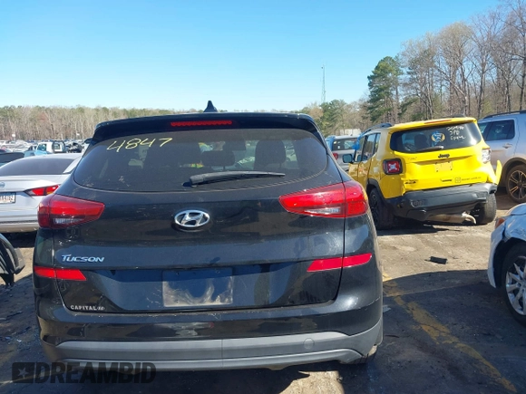 2021 Hyundai Tucson SE with VIN KM8J23A40MU334847, listed as a IAAI auction lot 41817556 with 63,000 mi miles and . Bid and sale history available at DreamBid. Image 16.