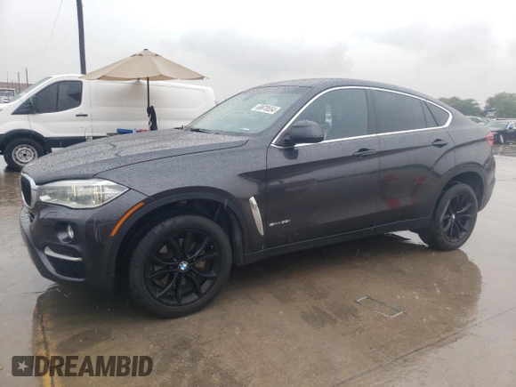 2015 BMW X6 sDrive35i with VIN 5UXKU0C59F0F91881, listed as a Copart auction lot 69878554 with 120,065 mi miles and Salvage Title. Bid and sale history available at carsss.com. Image 1.