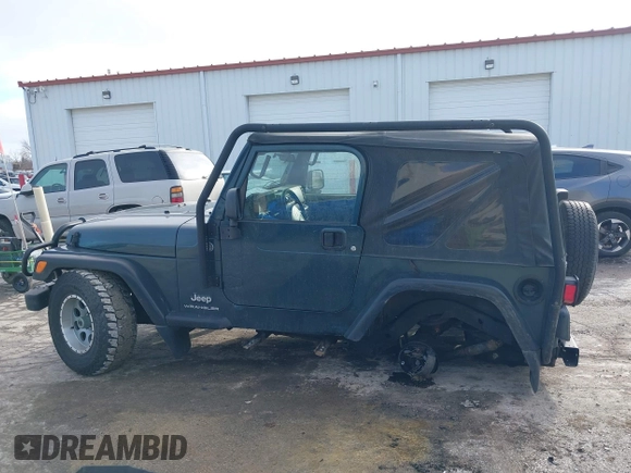 2005 Jeep Wrangler SE with VIN 1J4FA29S45P333916, listed as a IAAI auction lot 41214841 with 90,577 mi miles. Bid and sale history available at carsss.com. Image 14.