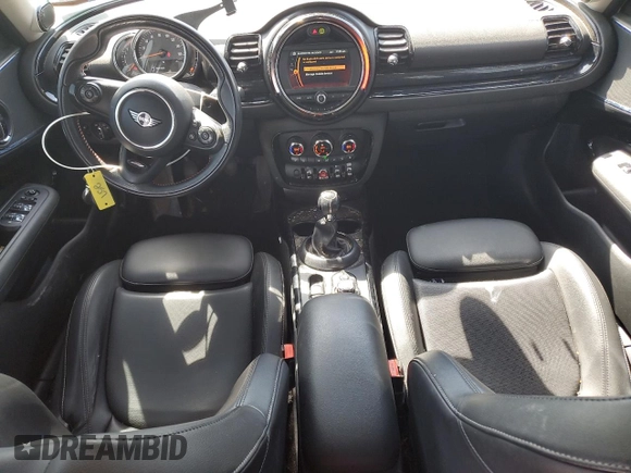 2019 MINI Clubman Cooper S z VIN WMWLU5C53K2G80151, wystawiony jako Copart lot #51054165 z przebiegiem 106 330 mil mil oraz Szkoda całkowita • Salvage title. Historia ofert i sprzedaży dostępna na DreamBid. Obrazek 8.