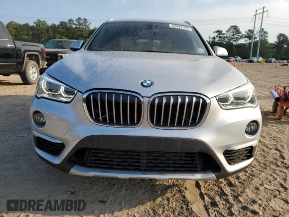 2016 BMW X1 xDrive28i with VIN WBXHT3Z34G4A49509, listed as a Copart auction lot 52992105 with 83,619 mi miles and Salvage Title. Bid and sale history available at carsss.com. Image 5.