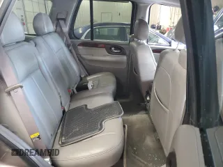 2005 GMC Envoy SLT z VIN 1GKDS13S152270398, wystawiony jako Copart lot #56160625 z przebiegiem 123 260 mil mil oraz Szkoda całkowita • Salvage title. Historia ofert i sprzedaży dostępna na DreamBid. Obrazek 11.