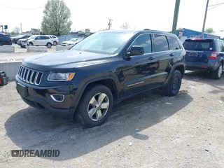 2014 Jeep Grand Cherokee Laredo with VIN 1C4RJFAG1EC315544, listed as a IAAI auction lot 42105987 with 164,430 mi miles. Bid and sale history available at carsss.com. Image 2.