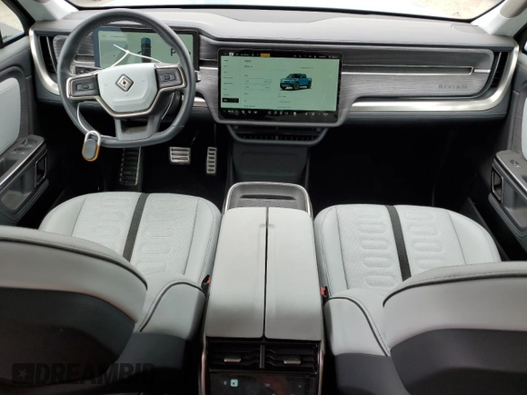 2023 Rivian R1T Launch Edition with VIN 7FCTGAAL7PN019188, listed as a Copart auction lot 55100405 with 13,654 mi miles and Salvage Title. Bid and sale history available at DreamBid. Image 8.
