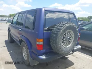 1998 Isuzu Trooper S with VIN JACDJ58X7W7914970, listed as a IAAI auction lot 42527384 with 178,470 mi miles and . Bid and sale history available at DreamBid. Image 3.