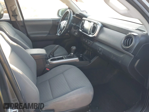 2021 Toyota Tacoma SR z VIN 3TYAX5GN2MT020997, wystawiony jako IAAI lot #40991578 z przebiegiem 81 509 mil mil oraz . Historia ofert i sprzedaży dostępna na DreamBid. Obrazek 5.