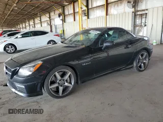2015 Mercedes-Benz SLK with VIN WDDPK7FA5FF111530, listed as a Copart auction lot 69940384 with 75,169 mi miles and Salvage title. Bid and sale history available at DreamBid. Image 1.