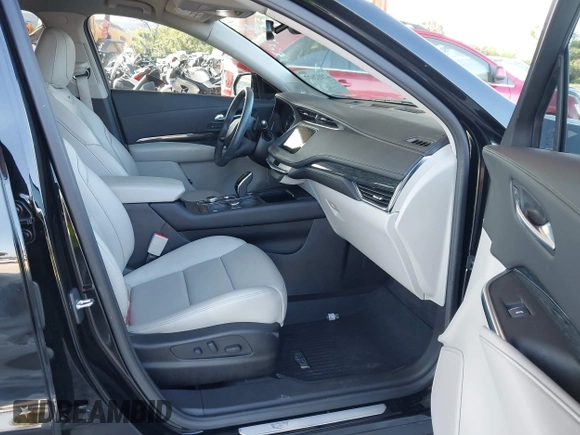 2020 Cadillac XT4 FWD Premium Luxury with VIN 1GYFZCR42LF144359, listed as a IAAI auction lot 42012677 with 34,490 mi miles and . Bid and sale history available at carsss.com. Image 5.