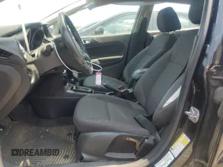 2014 Ford Fiesta SE z VIN 3FADP4BJ9EM176730, wystawiony jako Copart lot #58806365 z przebiegiem 93 814 mil mil oraz Szkoda całkowita • Salvage title. Historia ofert i sprzedaży dostępna na DreamBid. Obrazek 7.