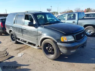 1999 Ford Expedition XLT with VIN 1FMRU1760XLB99695, listed as a IAAI auction lot 41396676 with 214,434 mi miles. Bid and sale history available at carsss.com. Image 1.