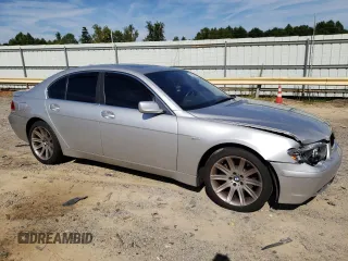 2003 BMW 7 Series 745i with VIN WBAGL63473DP68267, listed as a Copart auction lot 69923064 with 100,468 mi miles and Salvage title. Bid and sale history available at DreamBid. Image 4.