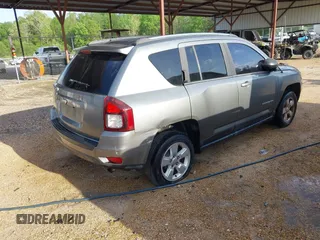 2014 Jeep Compass Sport with VIN 1C4NJCBA9ED594548, listed as a IAAI auction lot 41953586 with 194,593 mi miles. Bid and sale history available at carsss.com. Image 4.