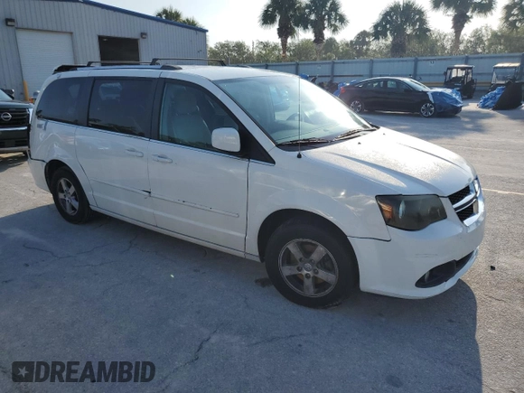 2011 Dodge Grand Caravan Crew with VIN 2D4RN5DG5BR755153, listed as a Copart auction lot 54404625 with 140,307 mi miles and Salvage Title. Bid and sale history available at DreamBid. Image 4.